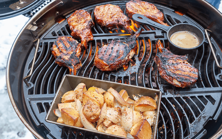 Apple smoked pork chops on a charcoal grill-6.png